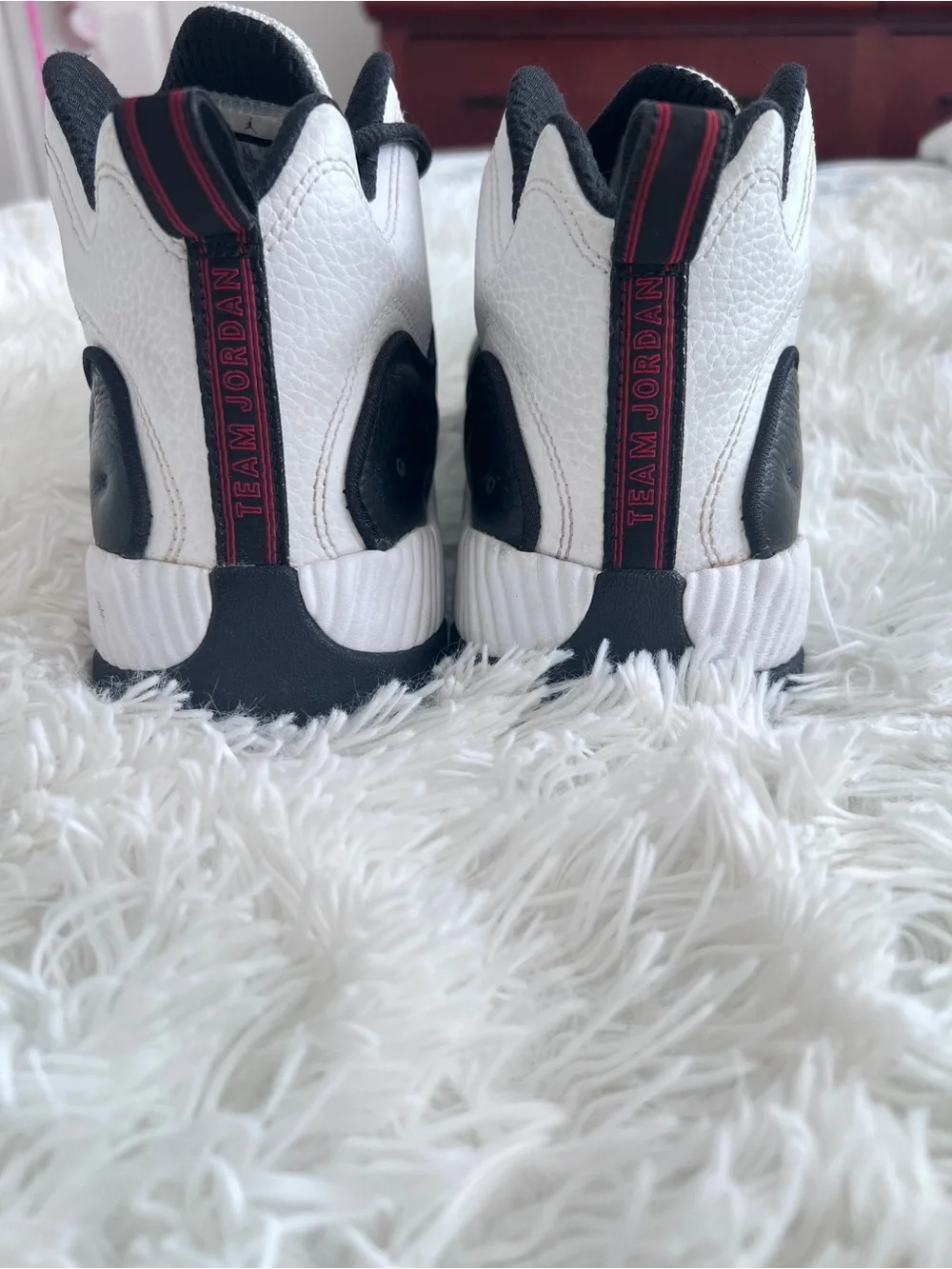 Jordans Black and White High-Top Basketball Sneakers